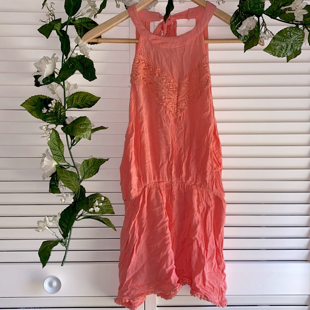 peach lace romper w/ pom pom detailing